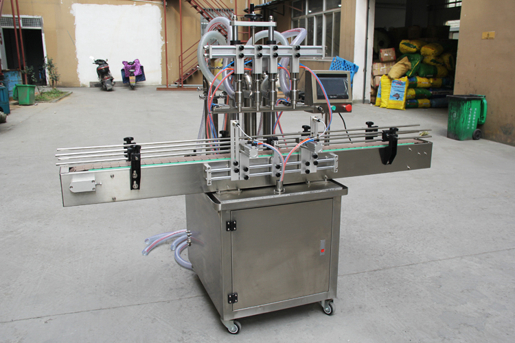4 heads automatic liquid filling machine