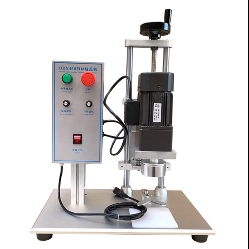 Máquina tampadora elétrica de mesa