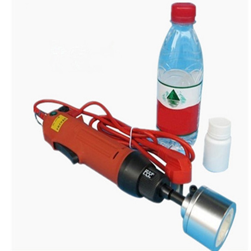 Máquina tampadora elétrica portátil